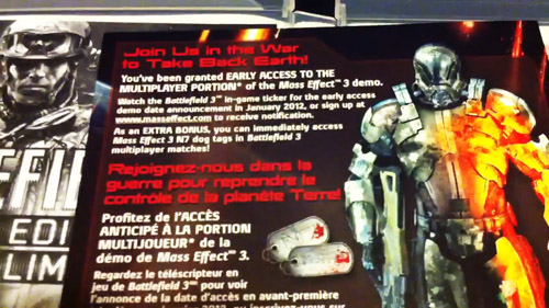 Карточка Mass Effect 3 из распакованного бокса Battlefield 3